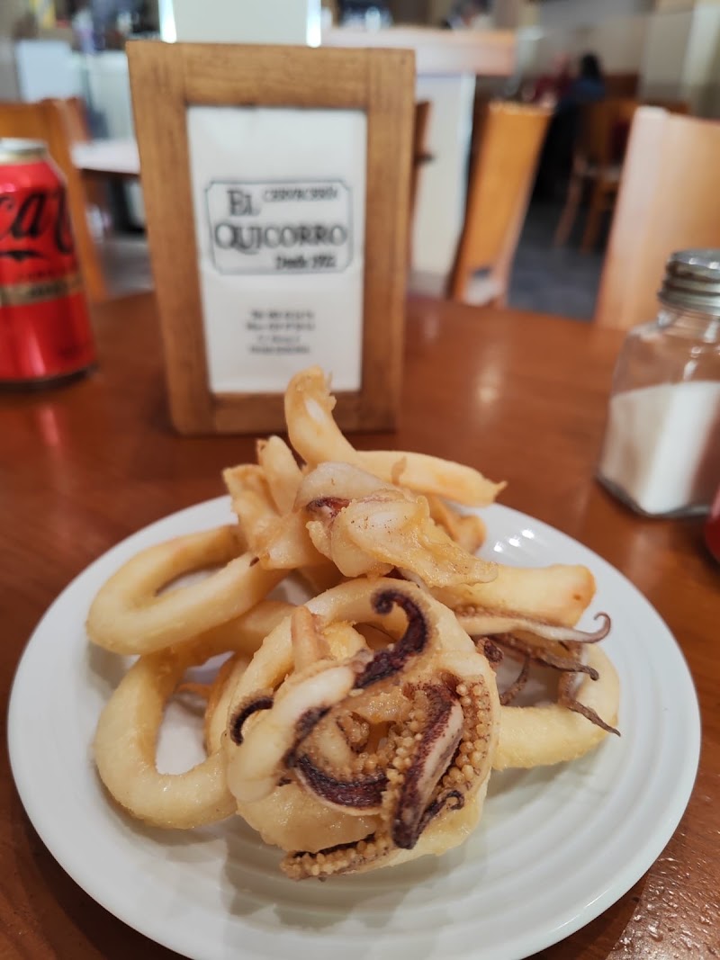 Calamar frito con carta de El Quicorro